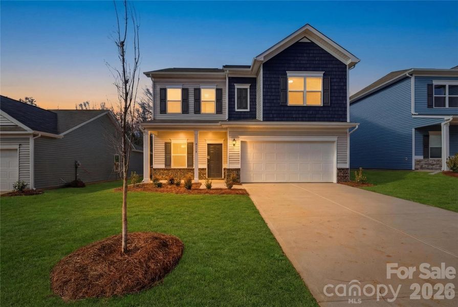 Front exterior of a new home in Catawba Trace, Catawba, NC, highlighting curb appeal (Image 2). Front exterior of a new home in Catawba Trace, Catawba, NC, highlighting curb appeal (Image 2).