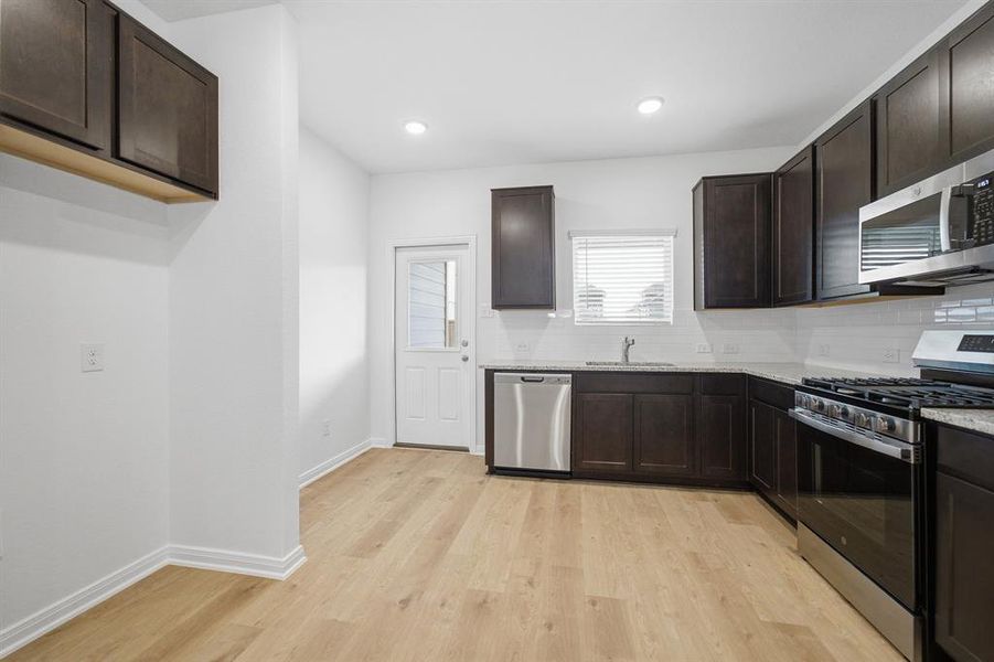 Furnished interior view inside a new home in Westridge, McKinney (Image 5).