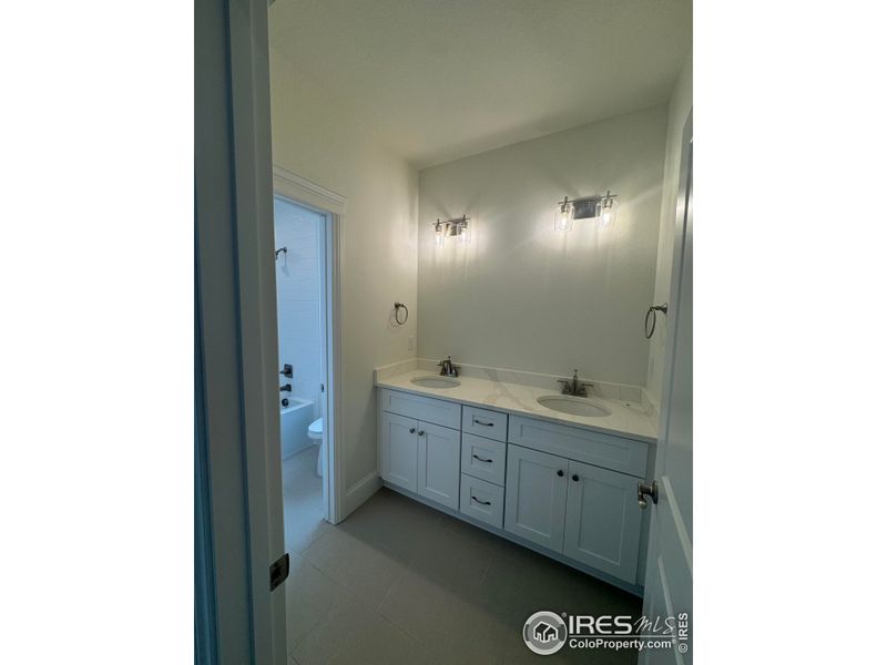 Furnished interior view inside a new home in Westerly, Erie (Image 9).