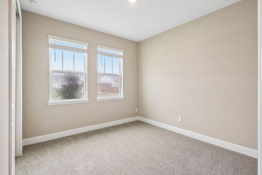 Spacious, unfurnished interior of a new home in Legends Preserve - Signature Series, Daytona Beach (Image 16).