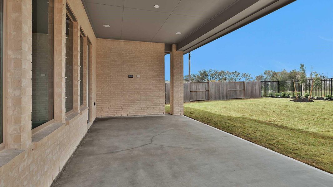 Exterior details and patio area of a home in Meridiana, Manvel (Image 3).