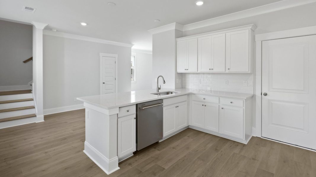 Representative furnished interior of a home built from the HARRIS by D.R. Horton in Sheep Island, Summerville (Image 6).
