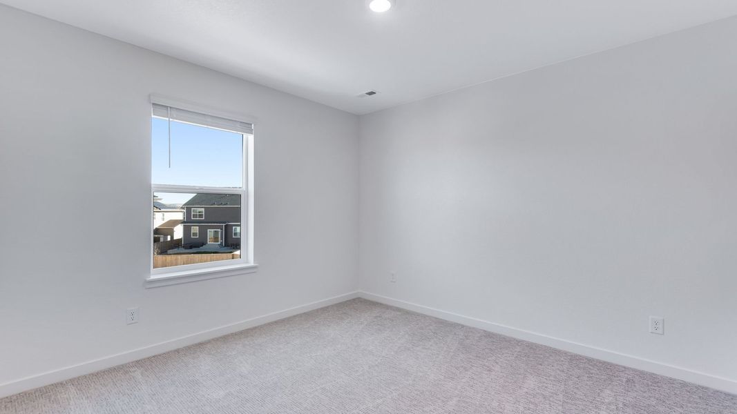 Spacious, unfurnished interior of a new home in Trails at Crowfoot, Parker (Image 17).