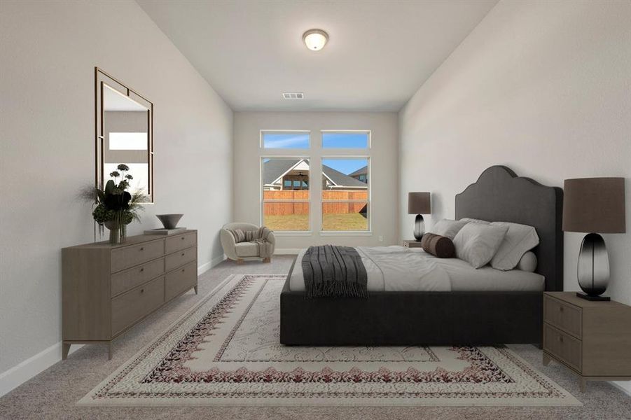 Bedroom with baseboards and light carpet