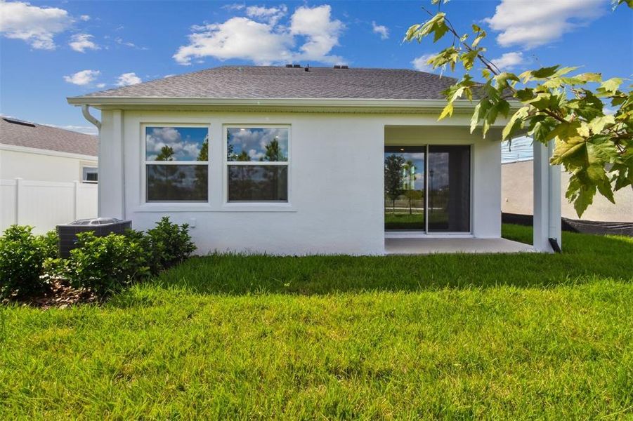 Exterior details and patio area of a home in Chapel Crossings - Garden Series, Wesley Chapel (Image 2).