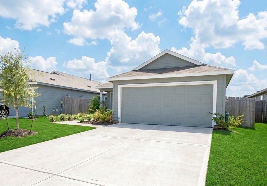 Front exterior of a new home in Wharton Lakes, Wharton, TX, highlighting curb appeal (Image 26).