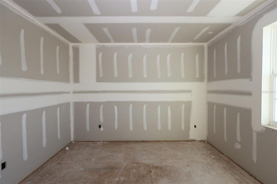 In-progress construction of a new home in Lake Star at Ovation, Winter Garden, FL (Image 23).