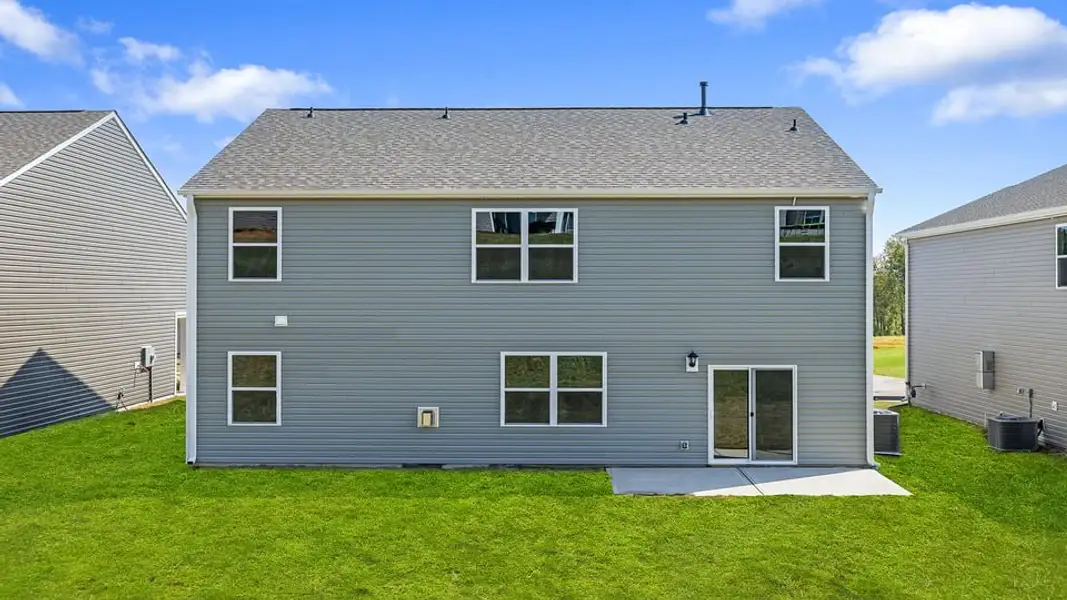 Exterior details and patio area of a home in Hunters Ridge, Woodruff (Image 4).