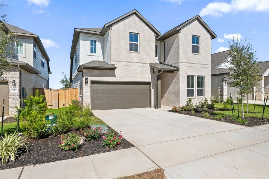 Front exterior of a new home in Arbor Collection At Park Central, Georgetown, TX, highlighting curb appeal (Image 25).