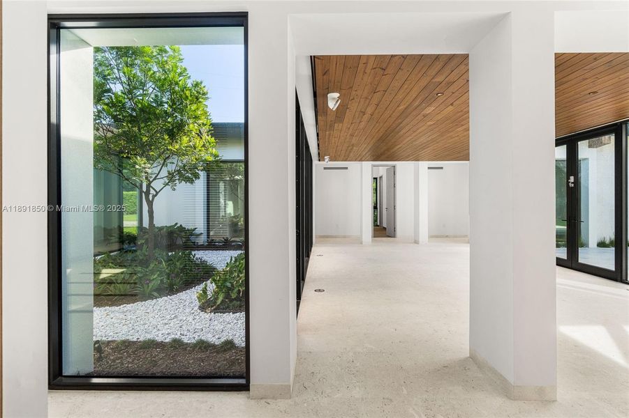 Exterior details and patio area of a home in , Coral Gables (Image 28).