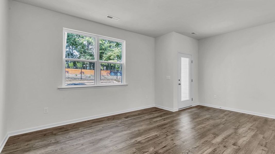 Spacious, unfurnished interior of a new home in The Townes at Bexford, Willow Spring (Image 11). Spacious, unfurnished interior of a new home in The Townes at Bexford, Willow Spring (Image 11).