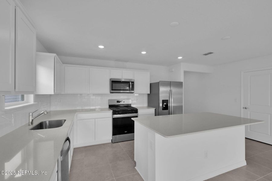 Furnished interior view inside a new home in Wells Landing, Jacksonville (Image 4). Furnished interior view inside a new home in Wells Landing, Jacksonville (Image 4).