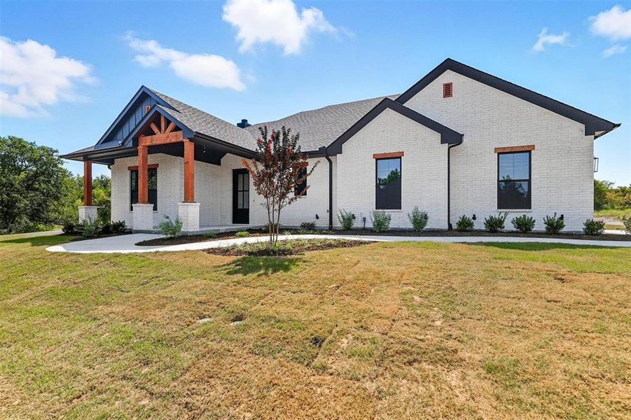 Front exterior of a new home in , Weatherford, TX, highlighting curb appeal (Image 1). Front exterior of a new home in , Weatherford, TX, highlighting curb appeal (Image 1).