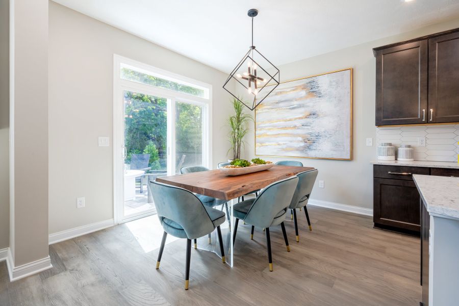 Representative furnished interior of a home built from the Charles by Fischer Homes in Twin Lakes, Hoschton (Image 41).