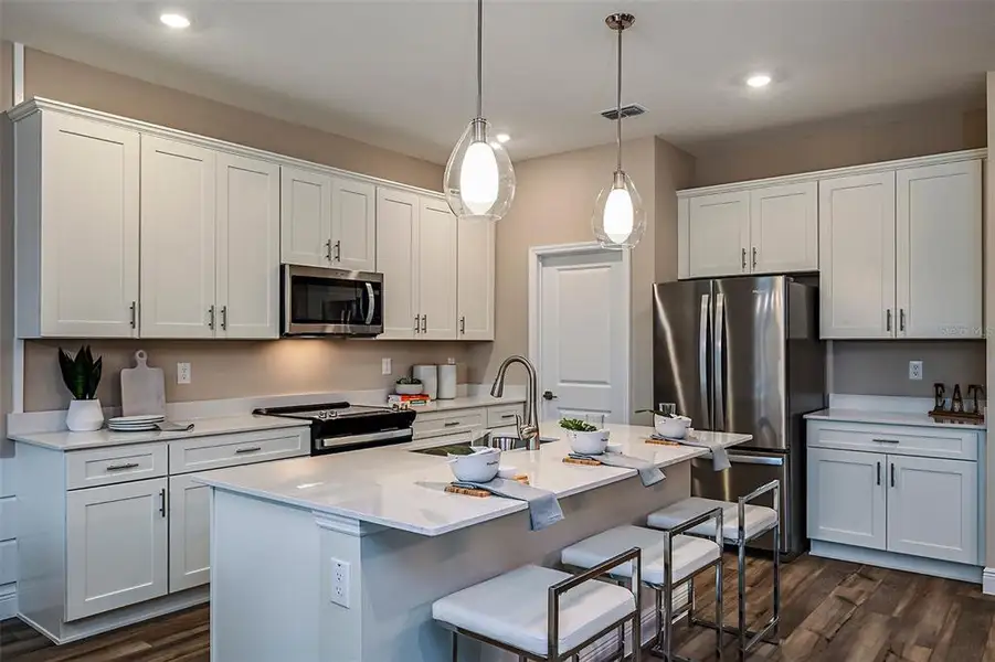 Furnished interior view inside a new home in Pasadena Woods, Dade City (Image 3).