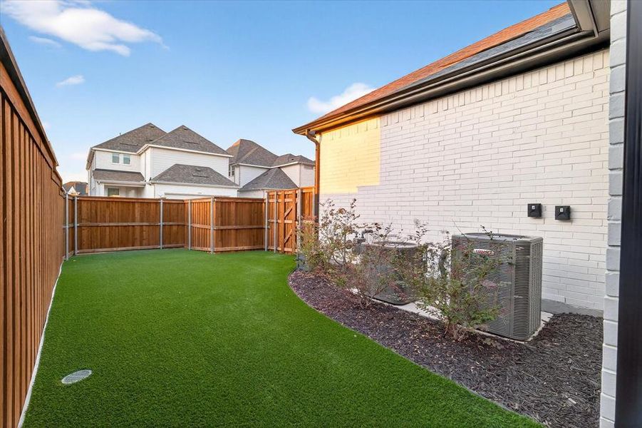 Turf! View of fenced backyard Turf! View of fenced backyard