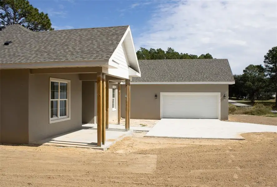 Exterior details and patio area of a home in Pine Ridge Estates, Beverly Hills (Image 2). Exterior details and patio area of a home in Pine Ridge Estates, Beverly Hills (Image 2).