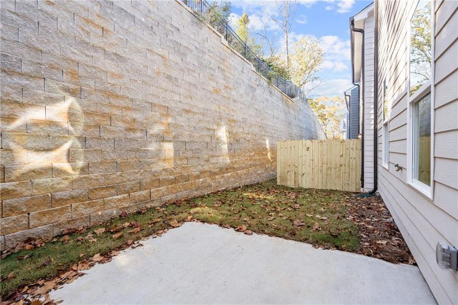 Exterior details and patio area of a home in The Village at Shallowford, Kennesaw (Image 21).