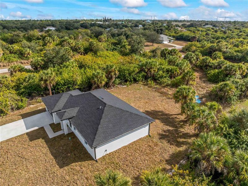 Front exterior of a new home in , Port Charlotte, FL, highlighting curb appeal (Image 29).