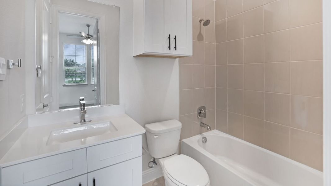 Representative furnished interior of a home built from the Appaloosa by D.R. Horton in The Avenue, Allen (Image 8).