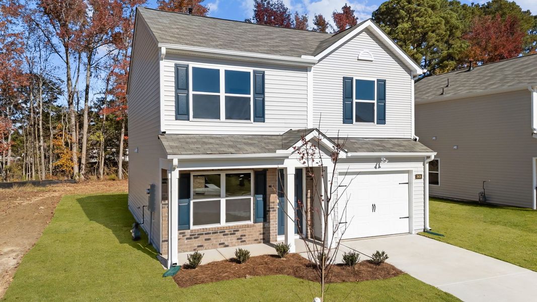 Front exterior of a new home in Jetstream Park, Wilson, NC, highlighting curb appeal (Image 17).