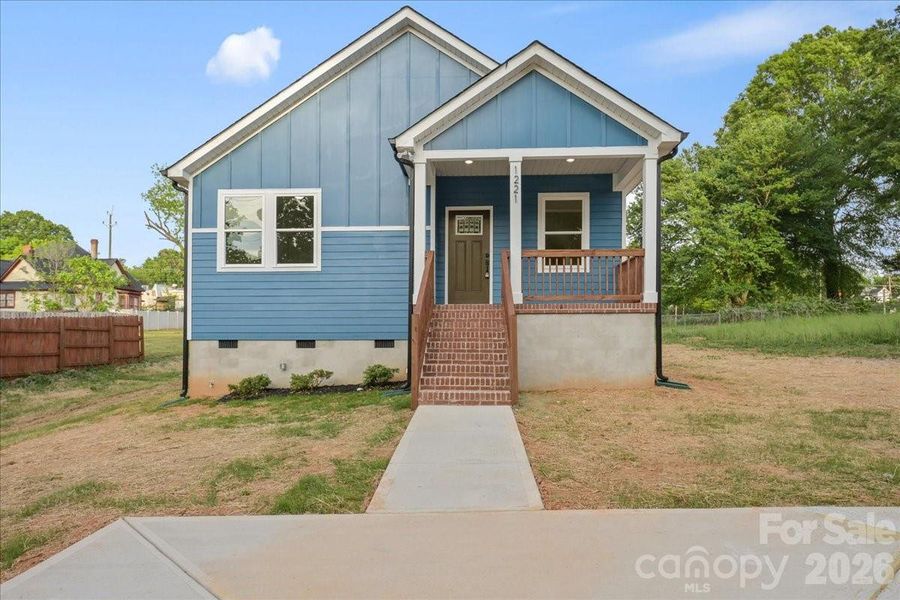 Front exterior of a new home in , Statesville, NC, highlighting curb appeal (Image 24).