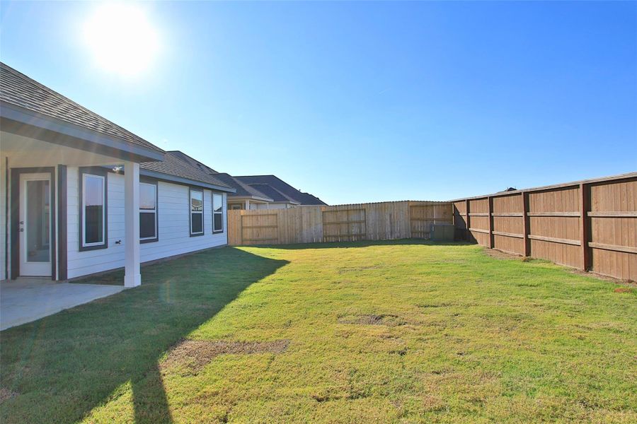 Exterior details and patio area of a home in Oakwood Estates, Waller (Image 3). Exterior details and patio area of a home in Oakwood Estates, Waller (Image 3).