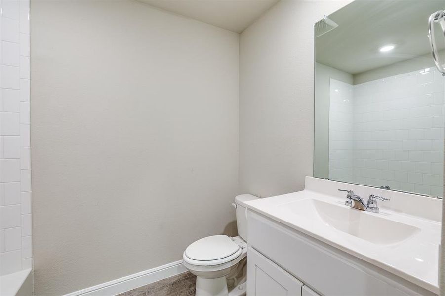 Full bathroom with vanity and a shower Full bathroom with vanity and a shower