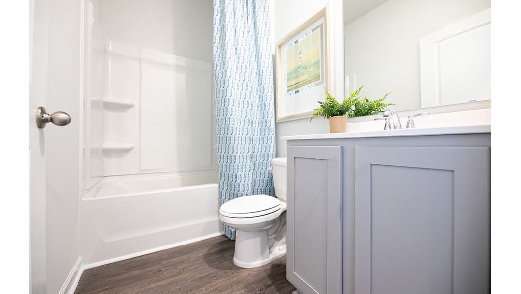 Furnished interior view inside a new home in The Parks, White House (Image 10).