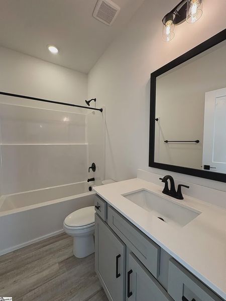 Furnished interior view inside a new home in Hidden Lake Estates, Greenville (Image 7).