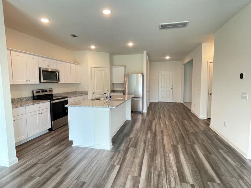 Furnished interior view inside a new home in Royal Pines, Porter (Image 5).