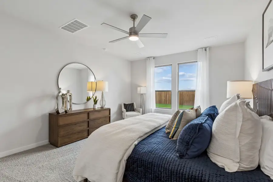 Primary Suite in a Madero Winters Model Home in Haslet TX by Trophy Signature Homes