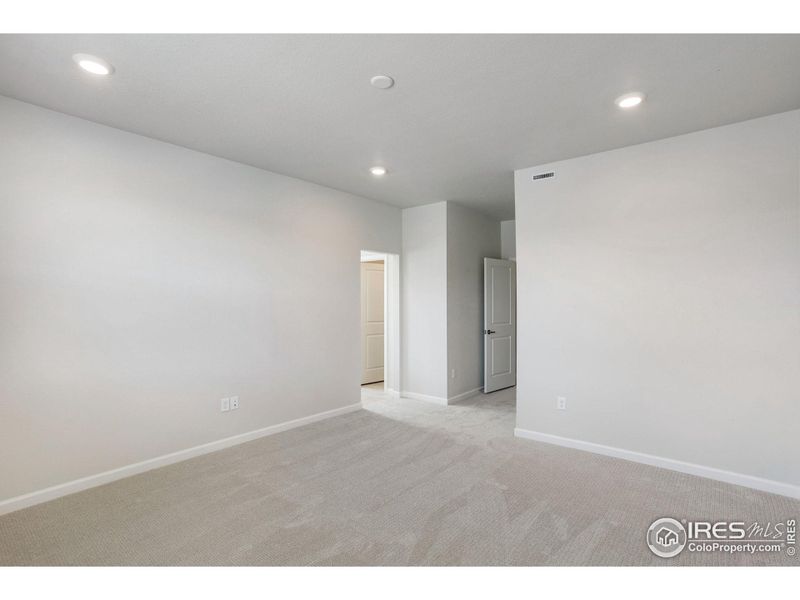 Spacious, unfurnished interior of a new home in Westside Crossing Townhomes, Berthoud (Image 16).