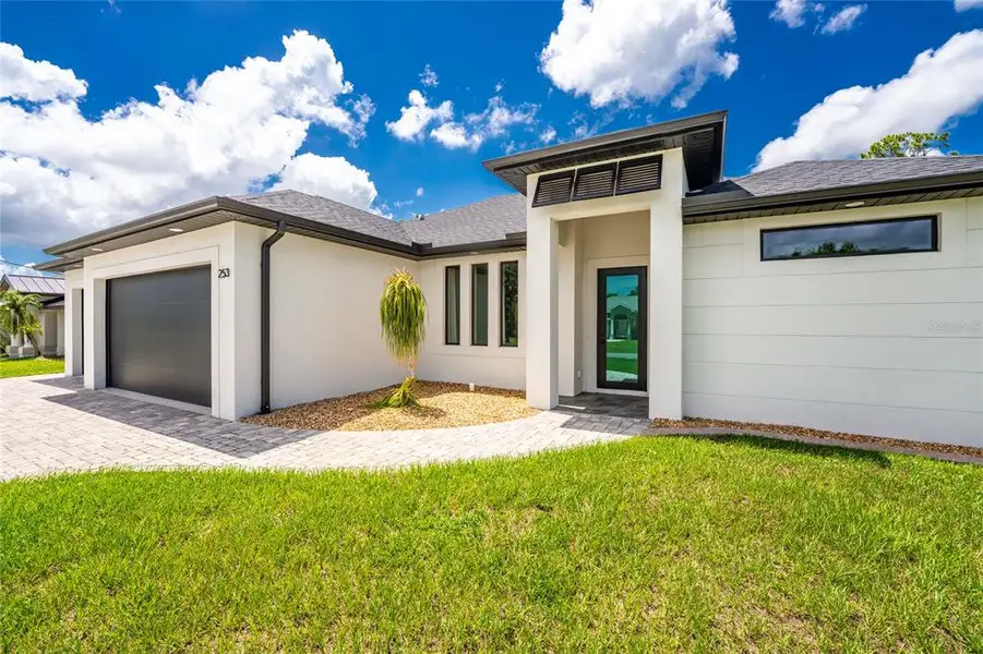 Exterior details and patio area of a home in , Rotonda West (Image 36).