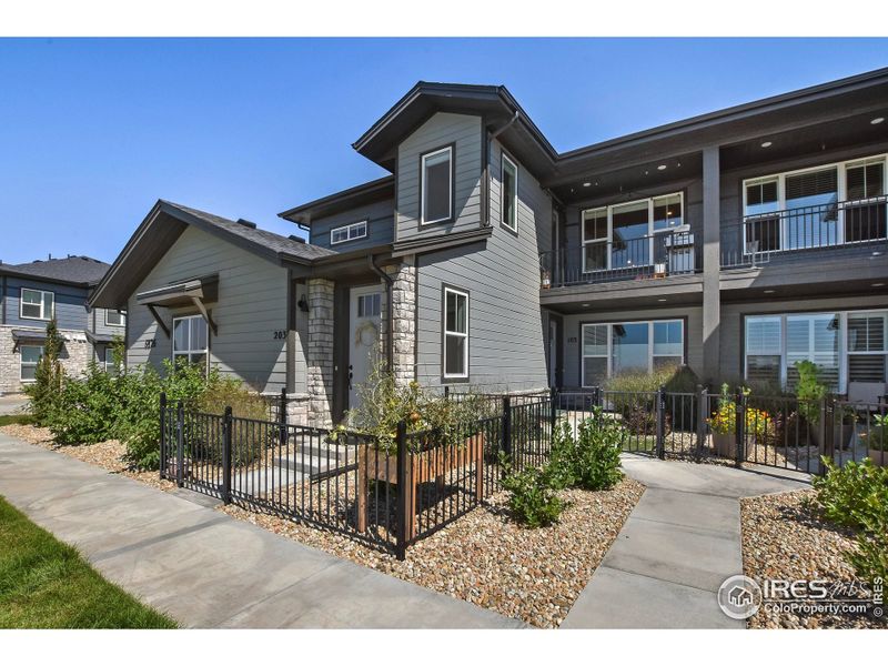 Front exterior of a new home in , Timnath, CO, highlighting curb appeal (Image 21).