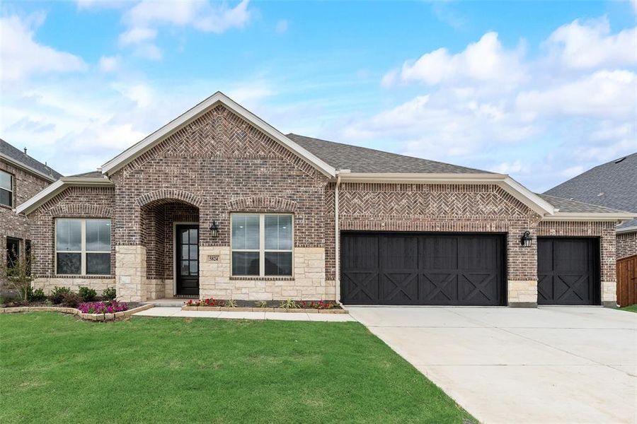 Front exterior of a new home in Sutton Fields, Celina, TX, highlighting curb appeal (Image 2).