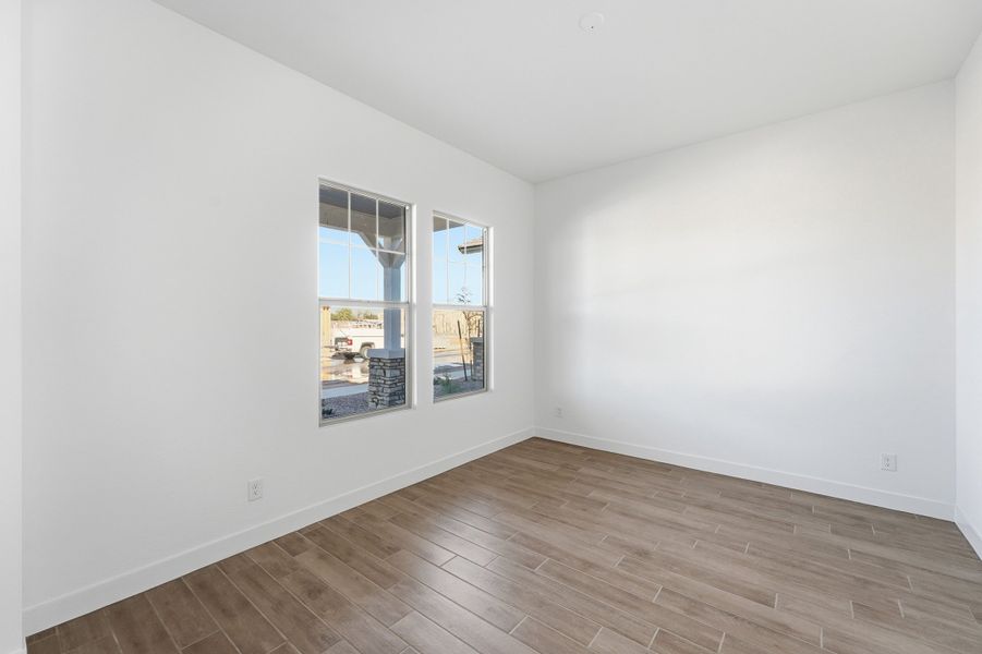 Spacious, unfurnished interior of a new home in Ellsworth Ranch, Queen Creek (Image 39).