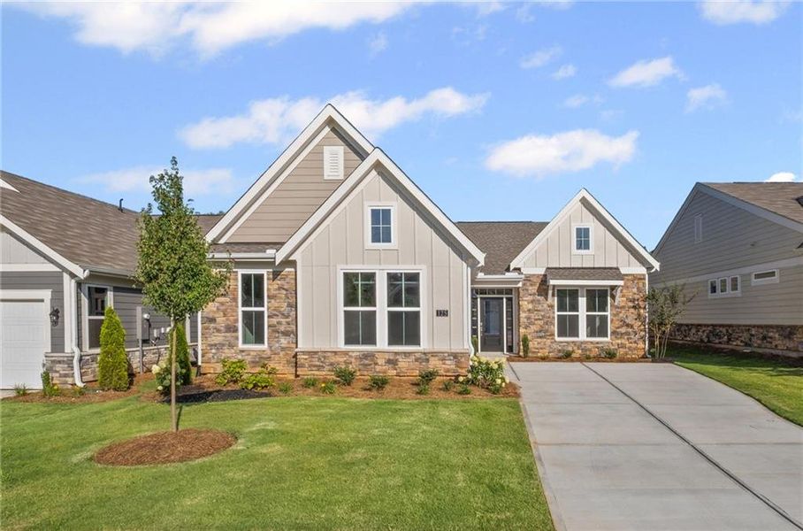 Front exterior of a new home in Laurel Farms, Dallas, GA, highlighting curb appeal (Image 29). Front exterior of a new home in Laurel Farms, Dallas, GA, highlighting curb appeal (Image 29).