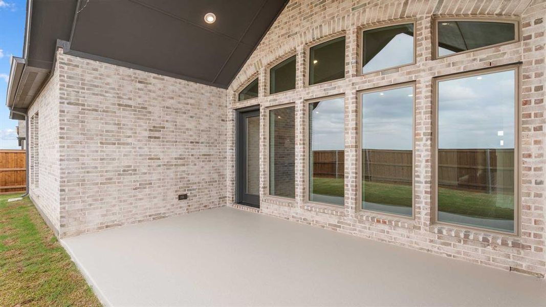 Exterior details and patio area of a home in Myrtle Creek 71', Waxahachie (Image 2).
