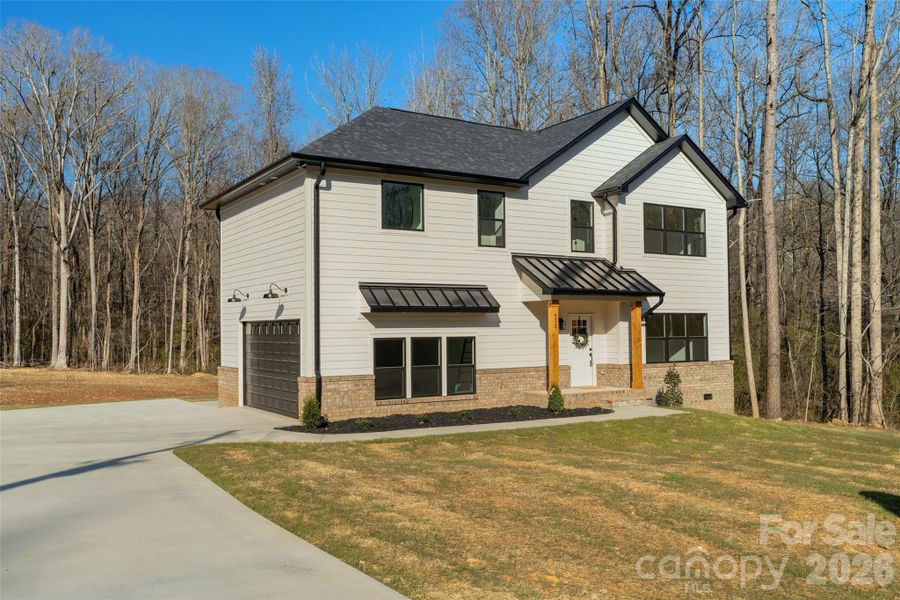 Exterior details and patio area of a home in , Waxhaw (Image 17).