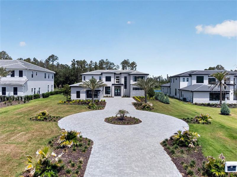 Front exterior of a new home in , Montverde, FL, highlighting curb appeal (Image 28).