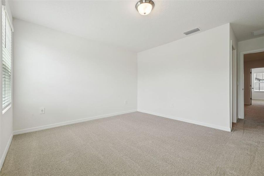 Spacious, unfurnished interior of a new home in Cagan Crossings West, Clermont (Image 20).