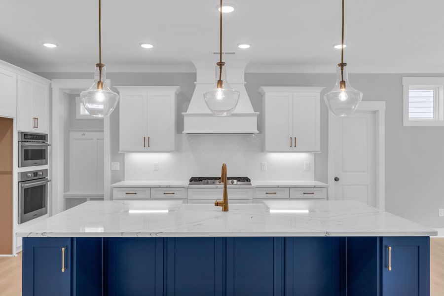 Representative furnished interior of a home built from the The Hampton by RobuckHomes in Stonehenge, Raleigh (Image 7).