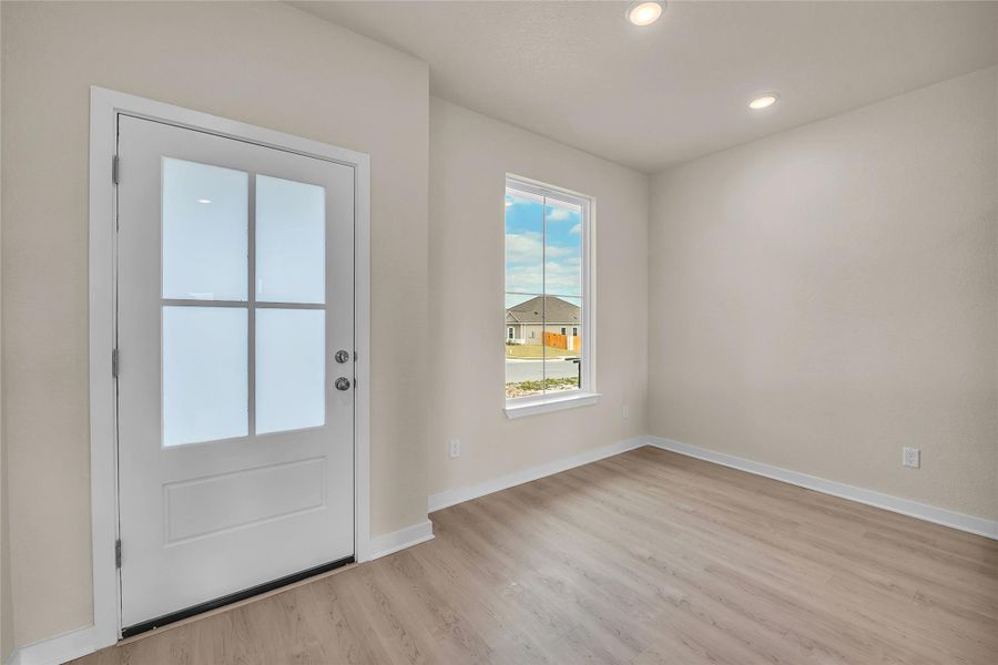 Foyer entrance featuring recessed lighting and light wood-type flooring
