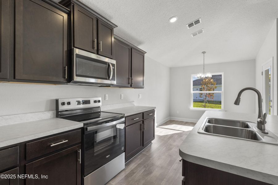 Furnished interior view inside a new home in Summerglen, Jacksonville (Image 6).
