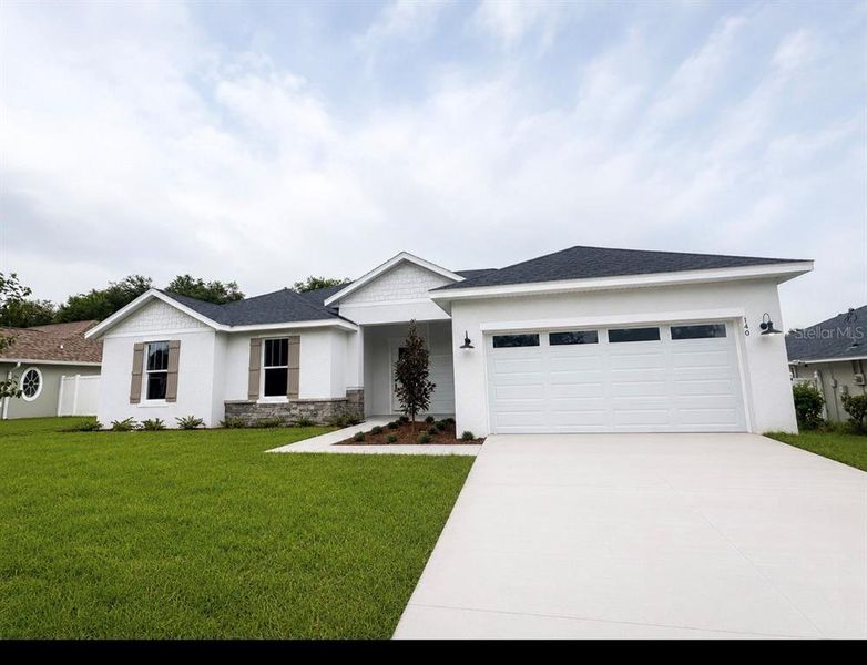 Front exterior of a new home in , Palm Coast, FL, highlighting curb appeal (Image 29).