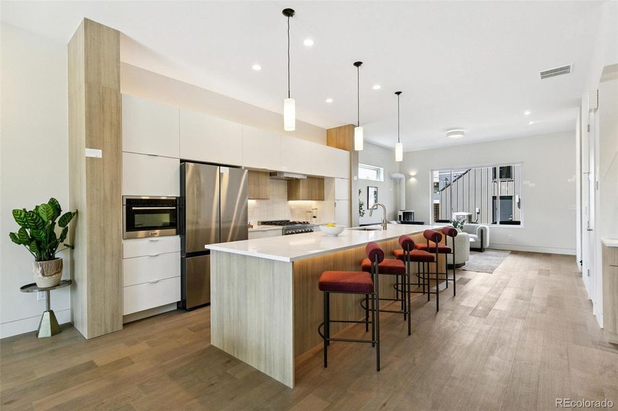 Custom Cabinetry Bookended by Floor to Ceiling Panels!