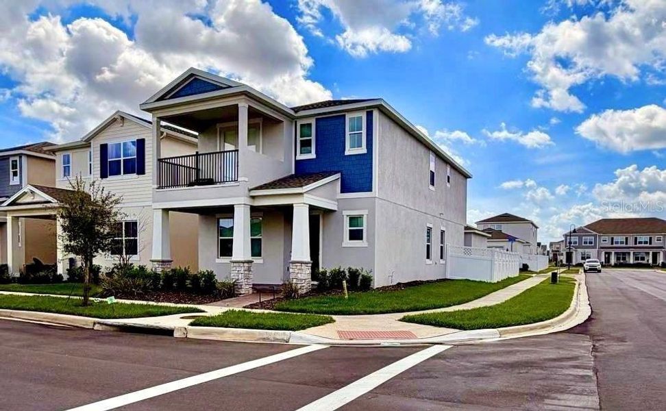 Front exterior of a new home in , Winter Garden, FL, highlighting curb appeal (Image 23).