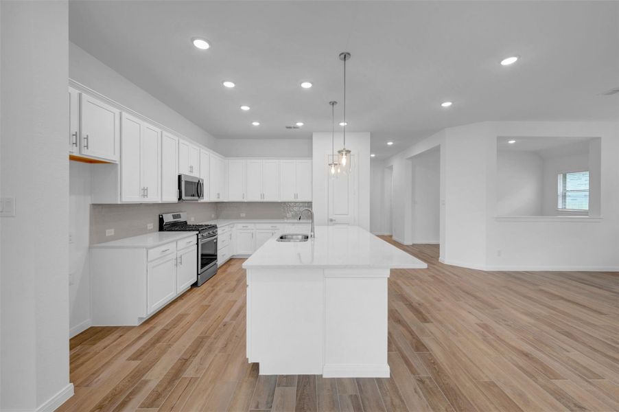 Furnished interior view inside a new home in Meridiana - Terrace Collection, Manvel (Image 6).