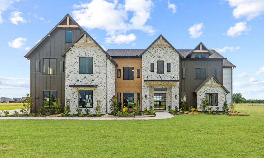 Front exterior of a new home in Lexington Heights, Nevada, TX, highlighting curb appeal (Image 1). Front exterior of a new home in Lexington Heights, Nevada, TX, highlighting curb appeal (Image 1).
